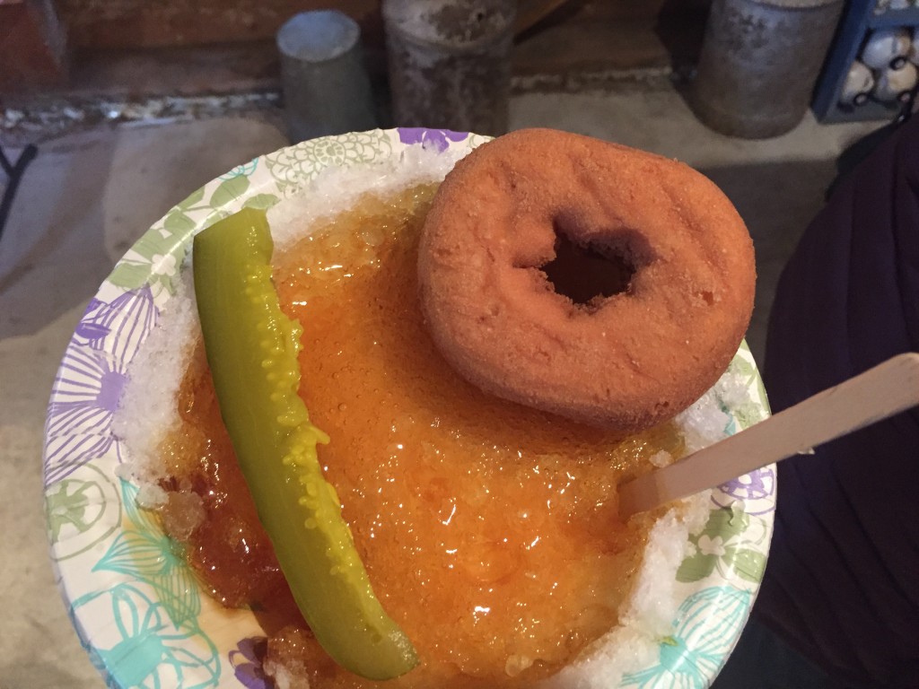 Sugar on Snow with a pickle and a maple donut