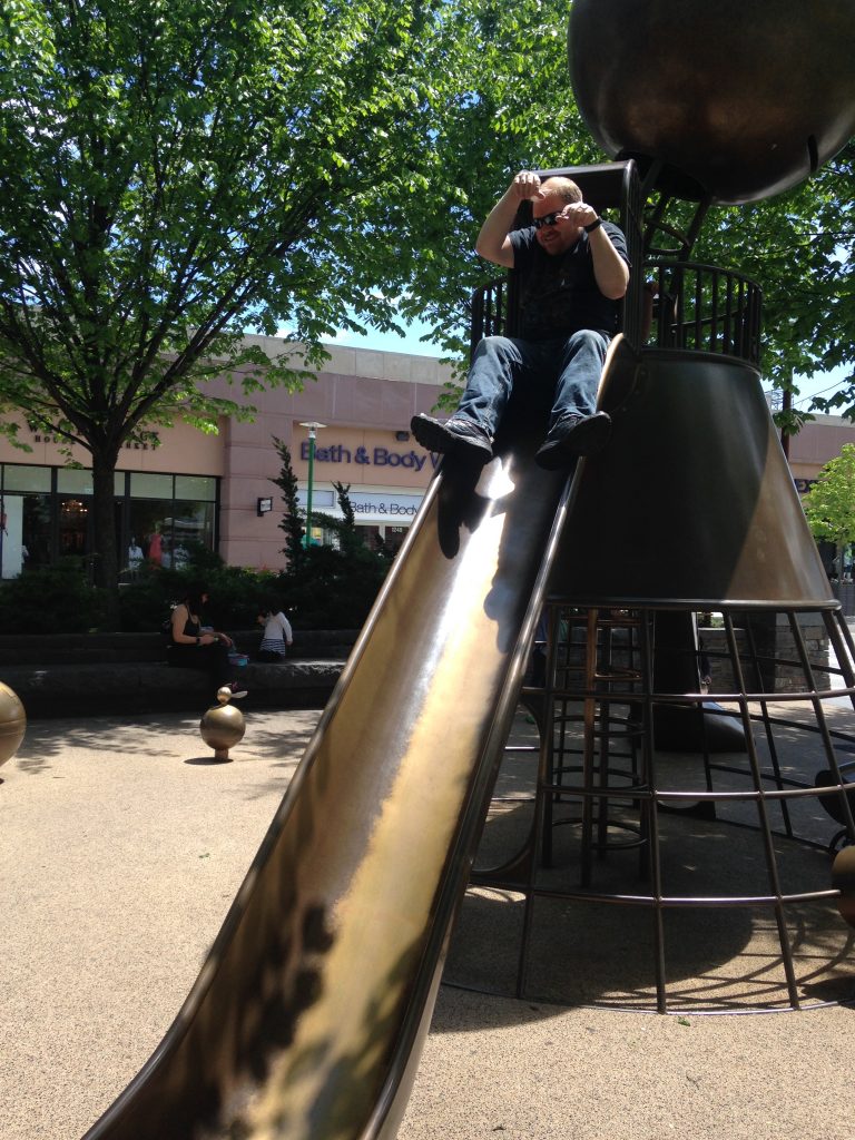 Grown Man Stuck on Slide